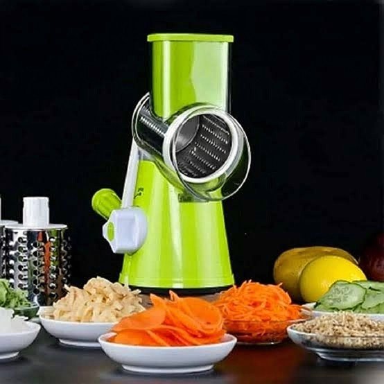 6-in-1 manual rotary vegetable cutter with stainless steel drum blades for slicing, shredding, and grating vegetables, cheese, nuts, and fruits.