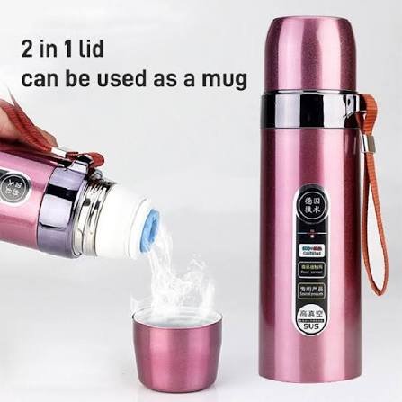 Stainless steel thermos bottle with 2-in-1 lid used as a drinking cup